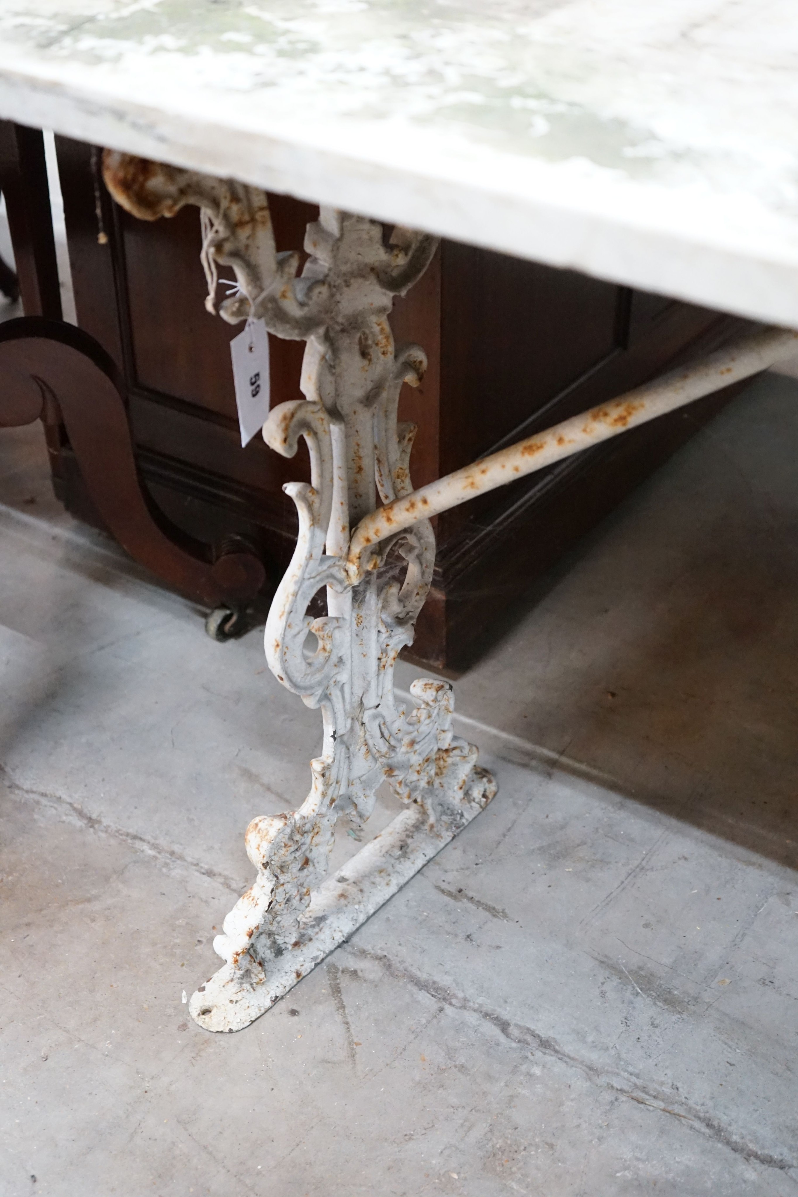 A Victorian rectangular cast iron marble top garden table, width 107cm, depth 53cm, height 72cm